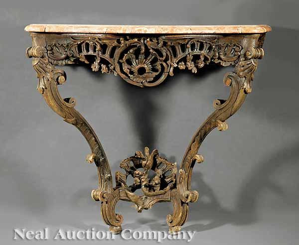 Appraisal: A Louis XV Carved Walnut Console Table c serpentine marble