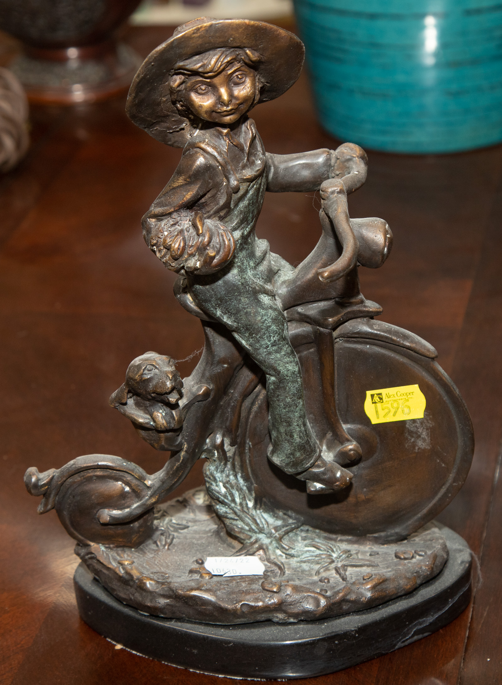 Appraisal: MODERN BRONZE SCULPTURE GIRL ON BIKE By M Monroe in