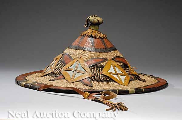 Appraisal: An African Leather and Woven Hat overall height in diameter