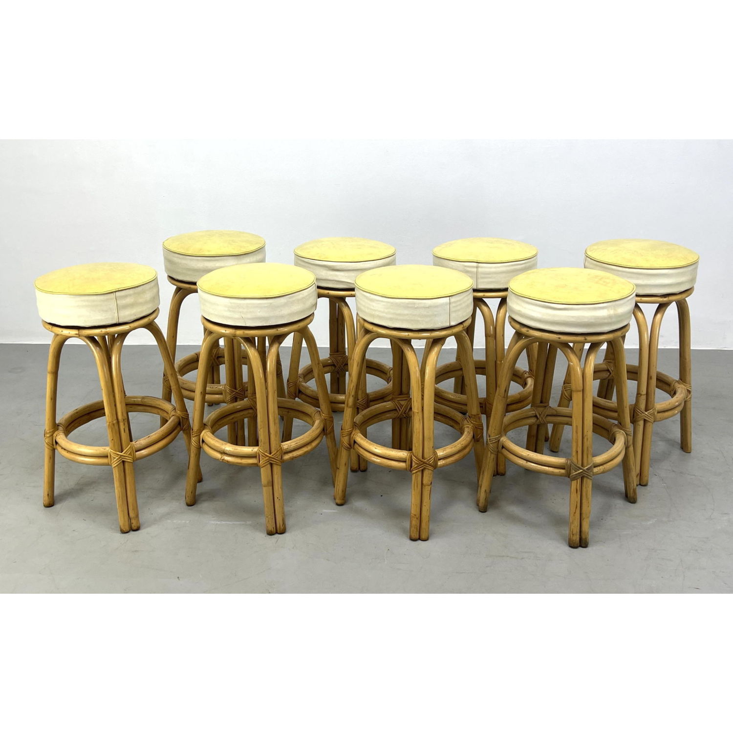 Appraisal: Set Rattan Bar Stools Mid Century Modern Wrapped frame Dimensions