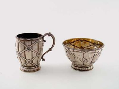 Appraisal: A Victorian mug and matching sugar bowl with bead borders