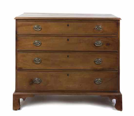 Appraisal: A Georgian Style Mahogany Chest of Drawers having a rectangular