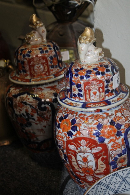 Appraisal: A PAIR OF JAPANESE IMARI LIDDED JARS cm three Chinese