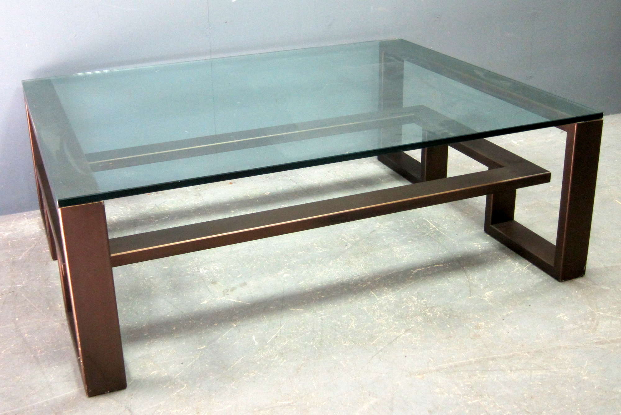 Appraisal: Contemporary bronzed metal and glass topped coffee table cm x