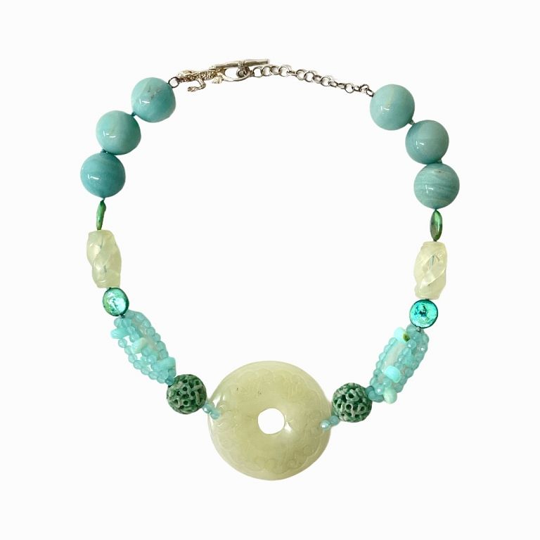 Appraisal: Carved Jade Necklace With marine motive and alligator metal clasp