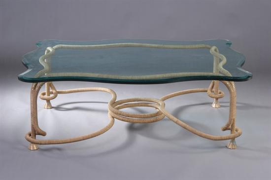 Appraisal: MODERN BRASS ROPE-FORM LOW TABLE late th century Astragal-form glass