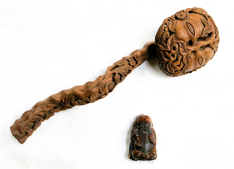 Appraisal: CHINESE BOXWOOD RUYI WITH ANIMAL HORN HAND PIECE the ornate