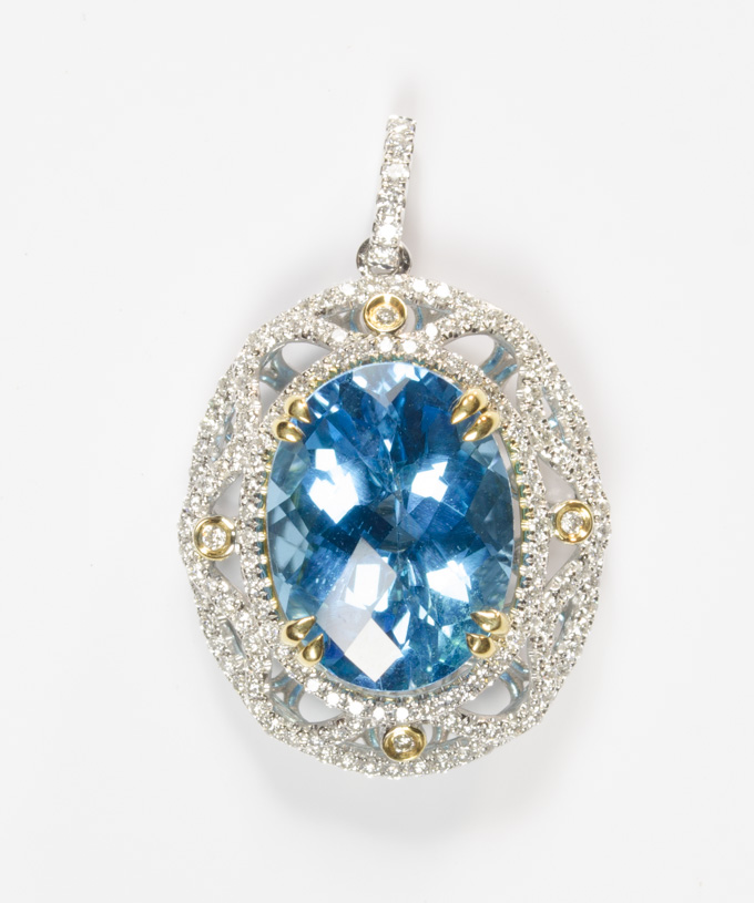 Appraisal: BLUE TOPAZ AND DIAMOND PENDANT k white and yellow gold