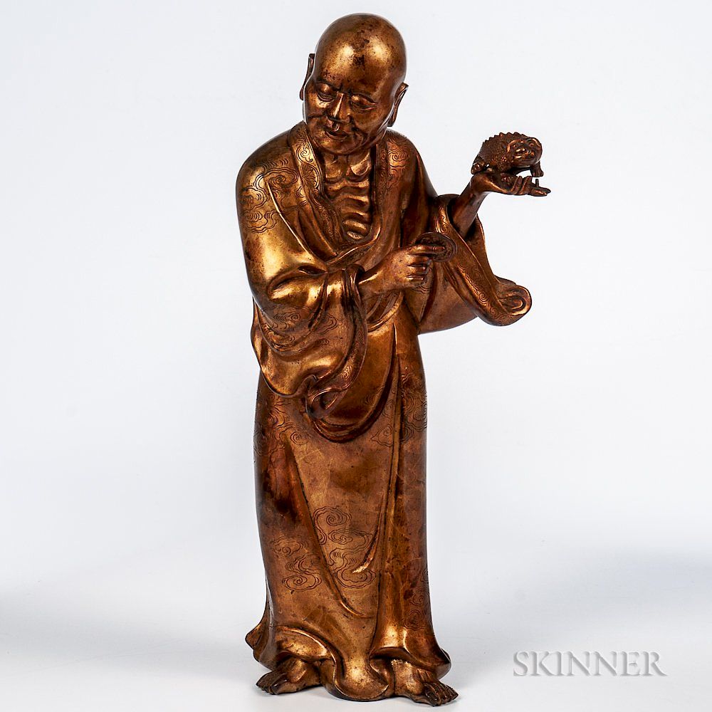 Appraisal: Gilt-bronze Figure of Luohan Gilt-bronze Figure of Luohan China Qing