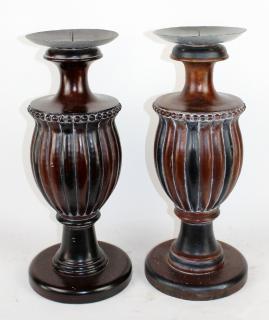 Appraisal: Pair of oversized mahogany candlesticks Pair of oversized mahogany candlesticks