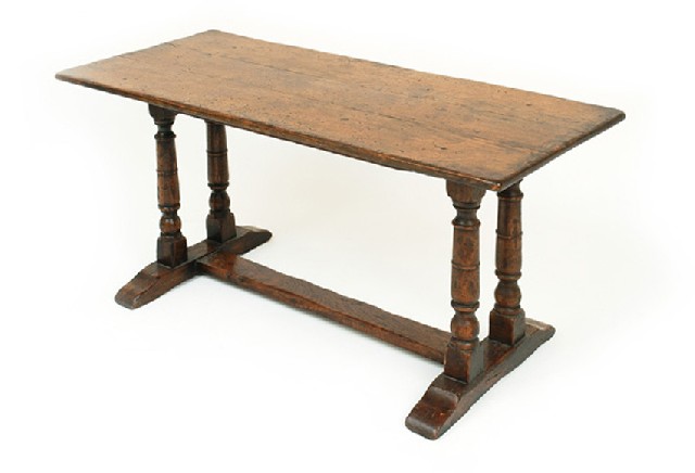 Appraisal: A JAMES I STYLE OAK REFECTORY TABLE The rectangular top