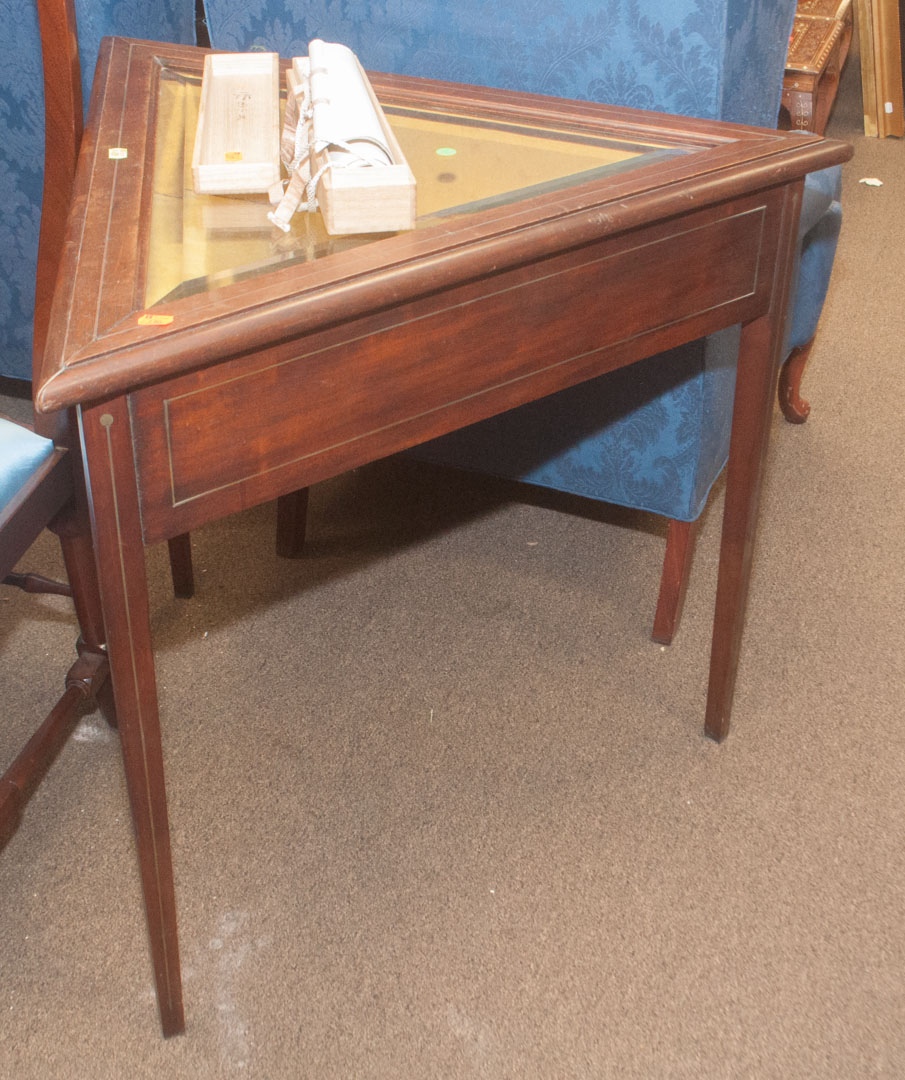 Appraisal: Triangular display table Undernumber