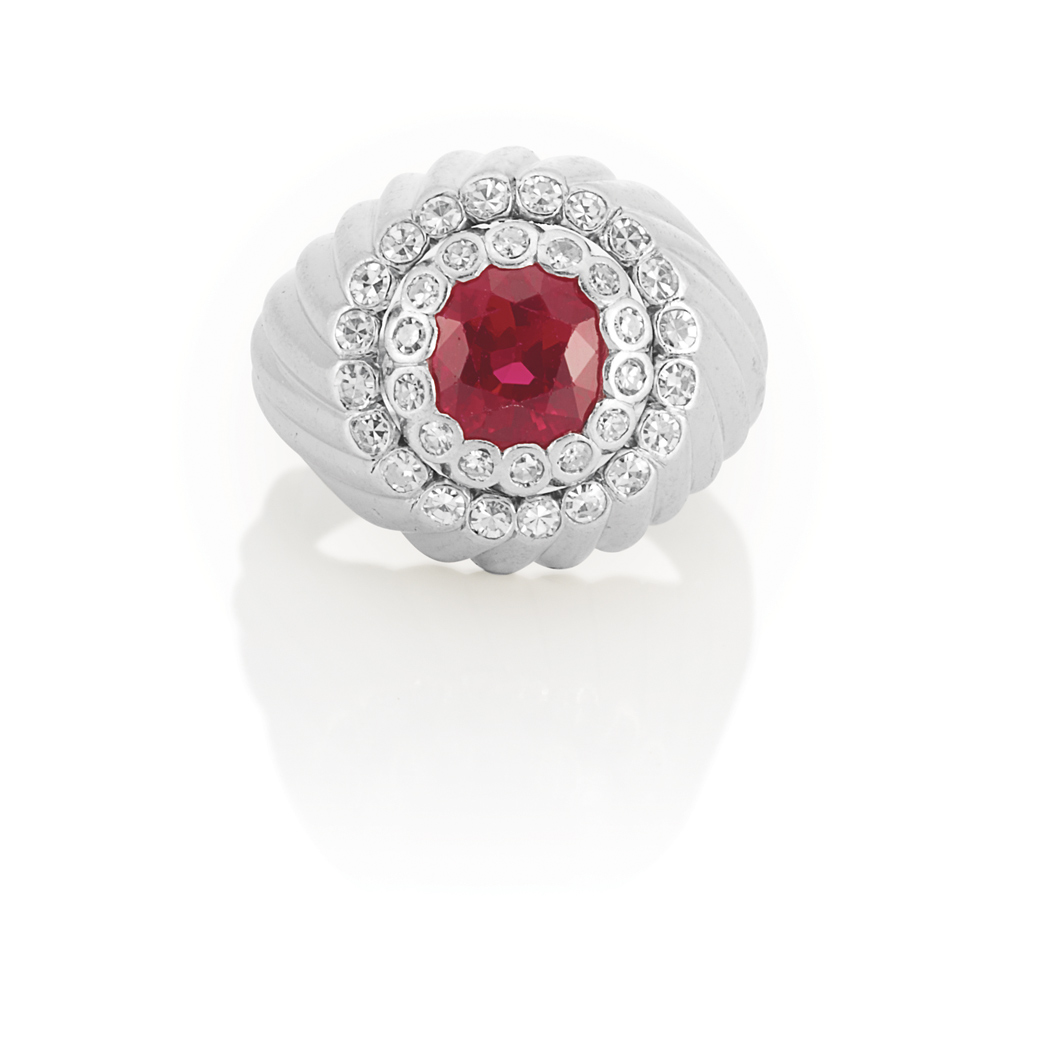 Appraisal: Platinum Ruby and Diamond Ring Centering one cushion-cut ruby approximately