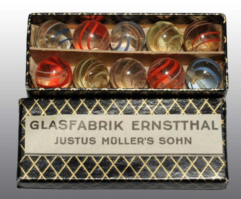 Appraisal: Lot of Lutz Marble Box Set Description Includes various colored