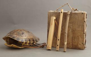 Appraisal: Two Primitive Drums one square covered in hide o Two