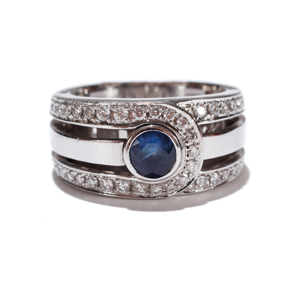 Appraisal: Ladies k white gold bezel set sapphire and diamond ring