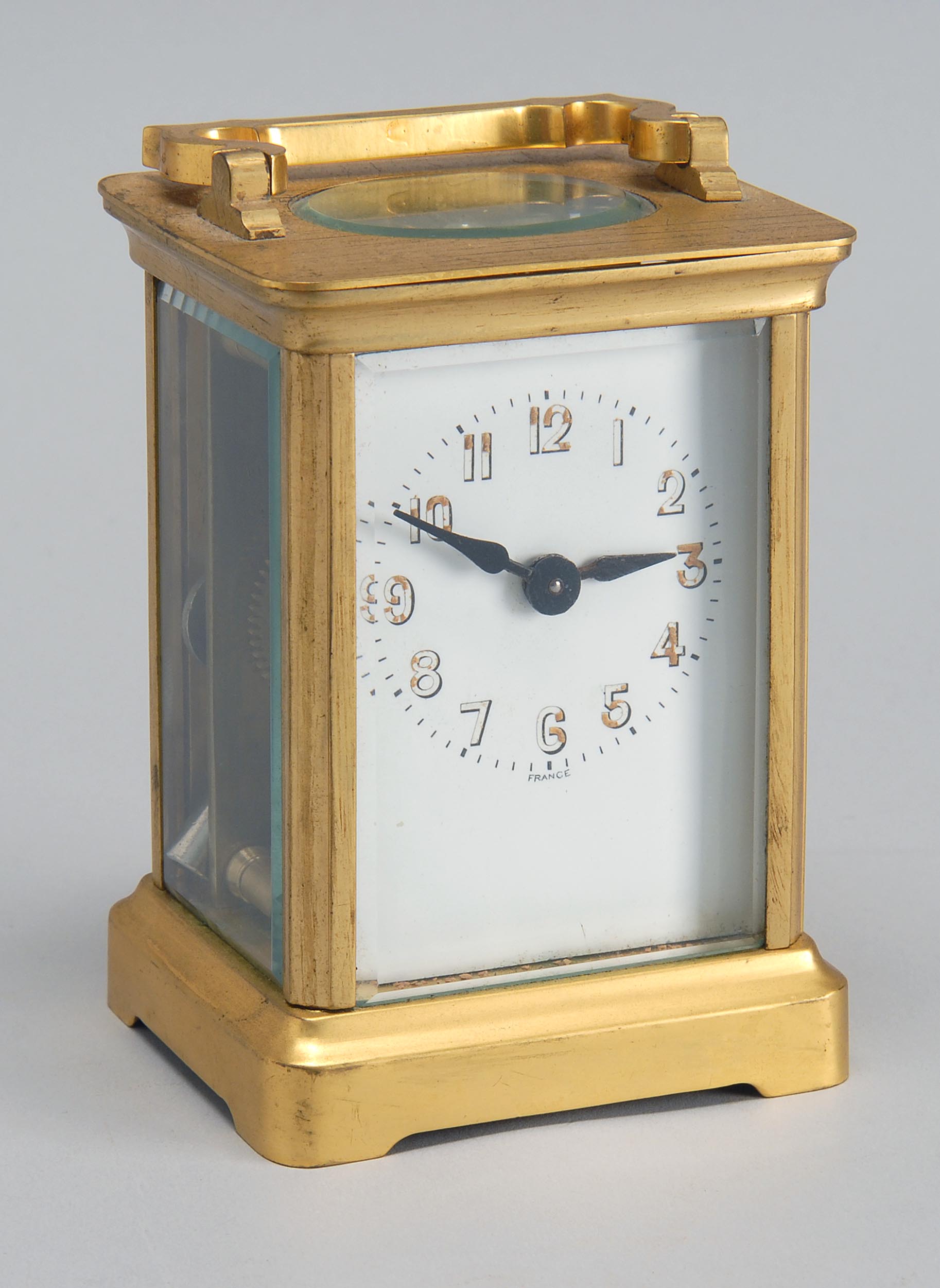 Appraisal: FRENCH CARRIAGE CLOCK Brass case with beveled glass Height ConditionNot