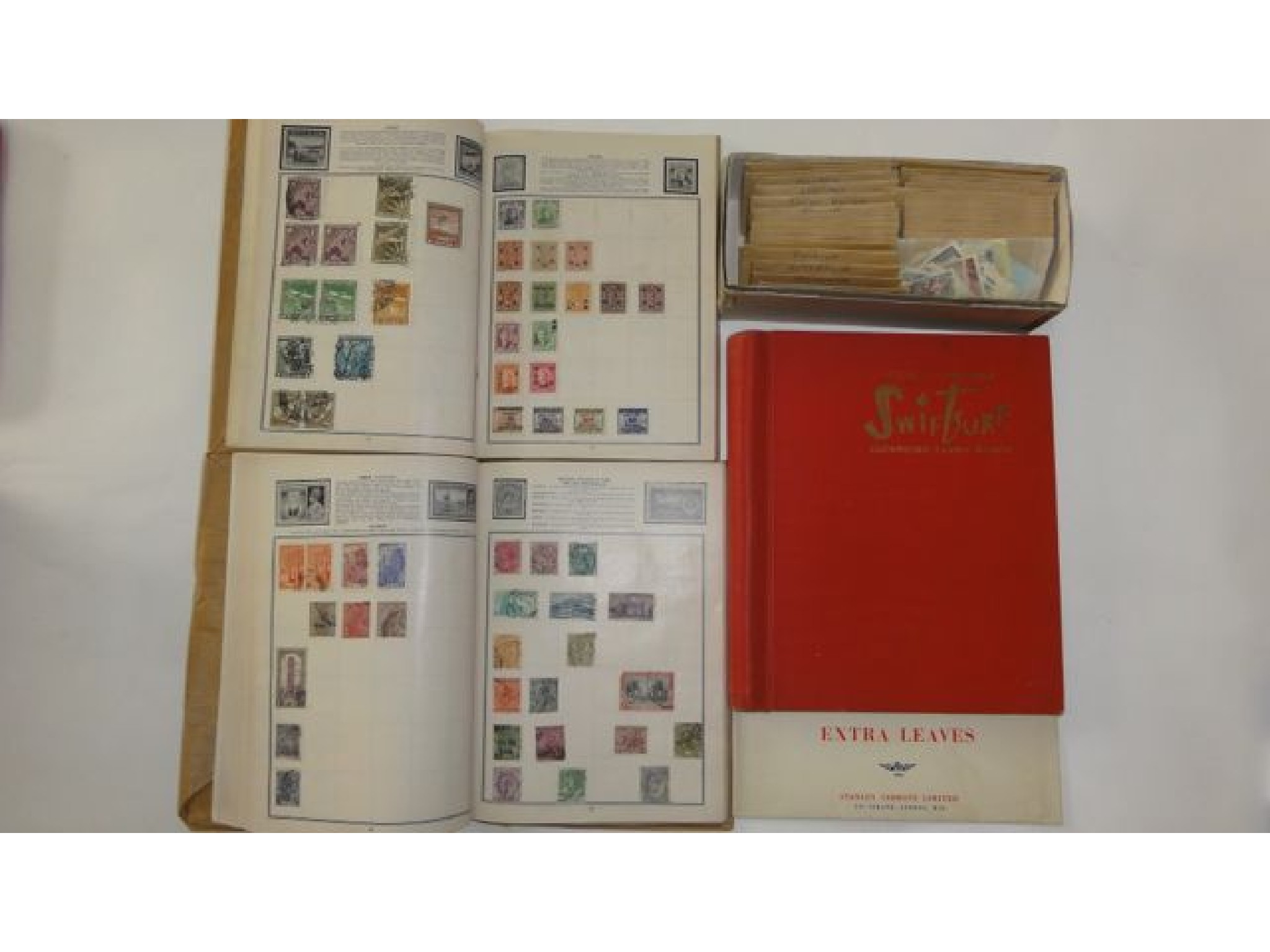 Appraisal: Three various stamp albums containing a miscellaneous collection of worldwide