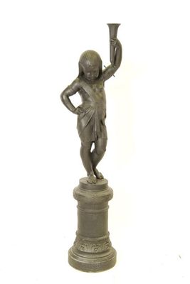 Appraisal: An Egyptian revival cast iron figural torchere modelled as a