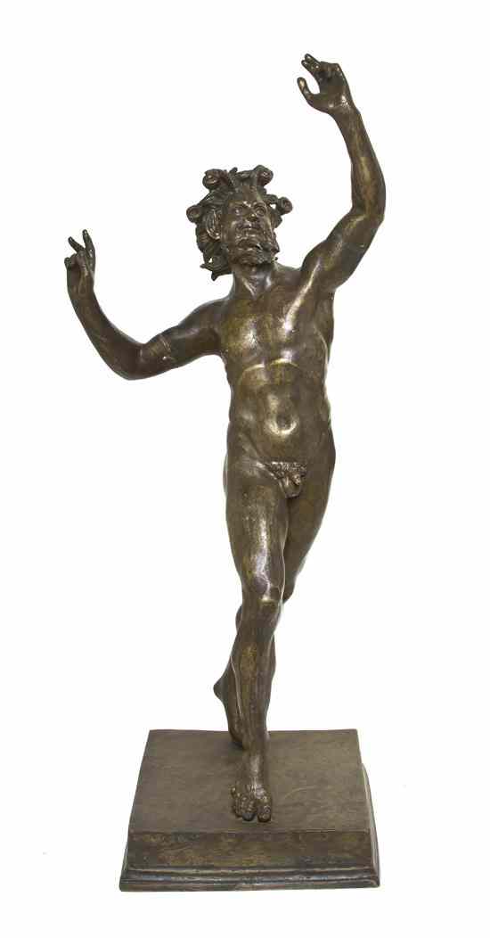 Appraisal: A Continental Bronzed Figure after the Antique depicting a dancing