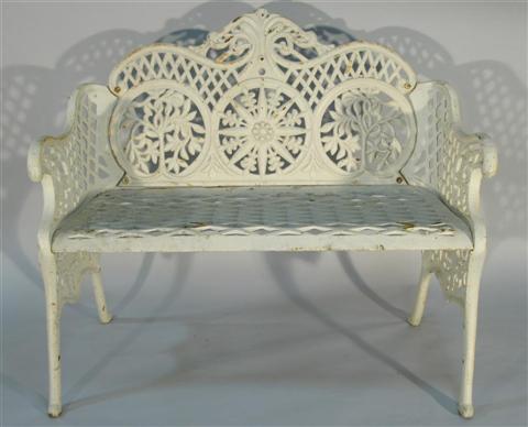 Appraisal: WHITE PAINTED WROUGHT IRON GARDEN BENCH th century the scrolling