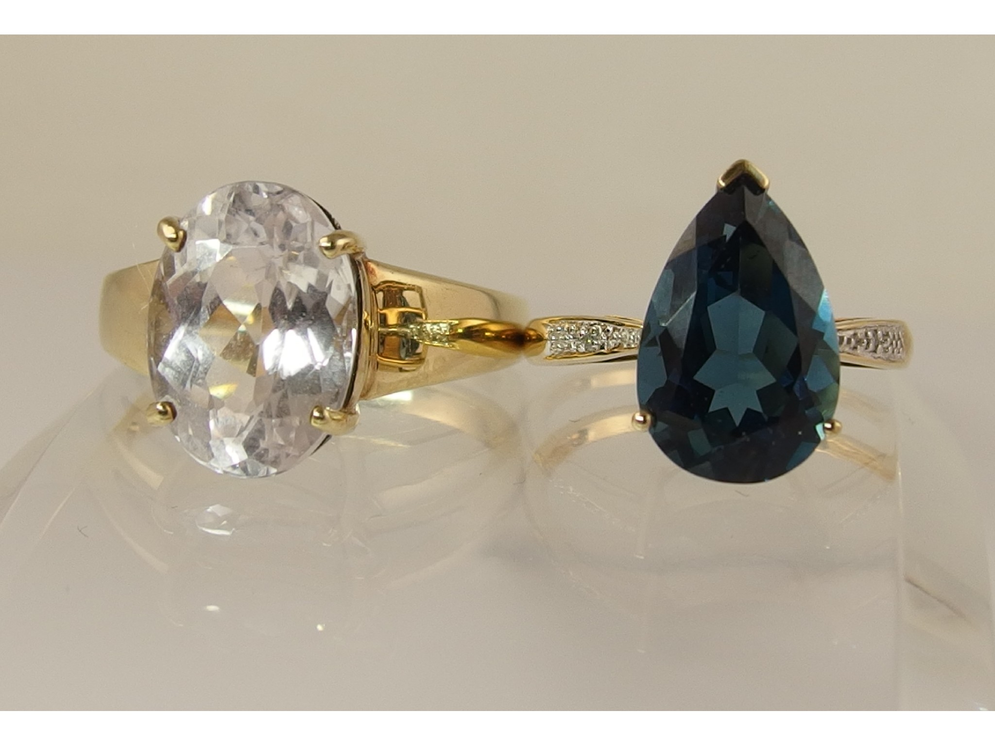 Appraisal: A ct neptune topaz and diamond ring and a gents