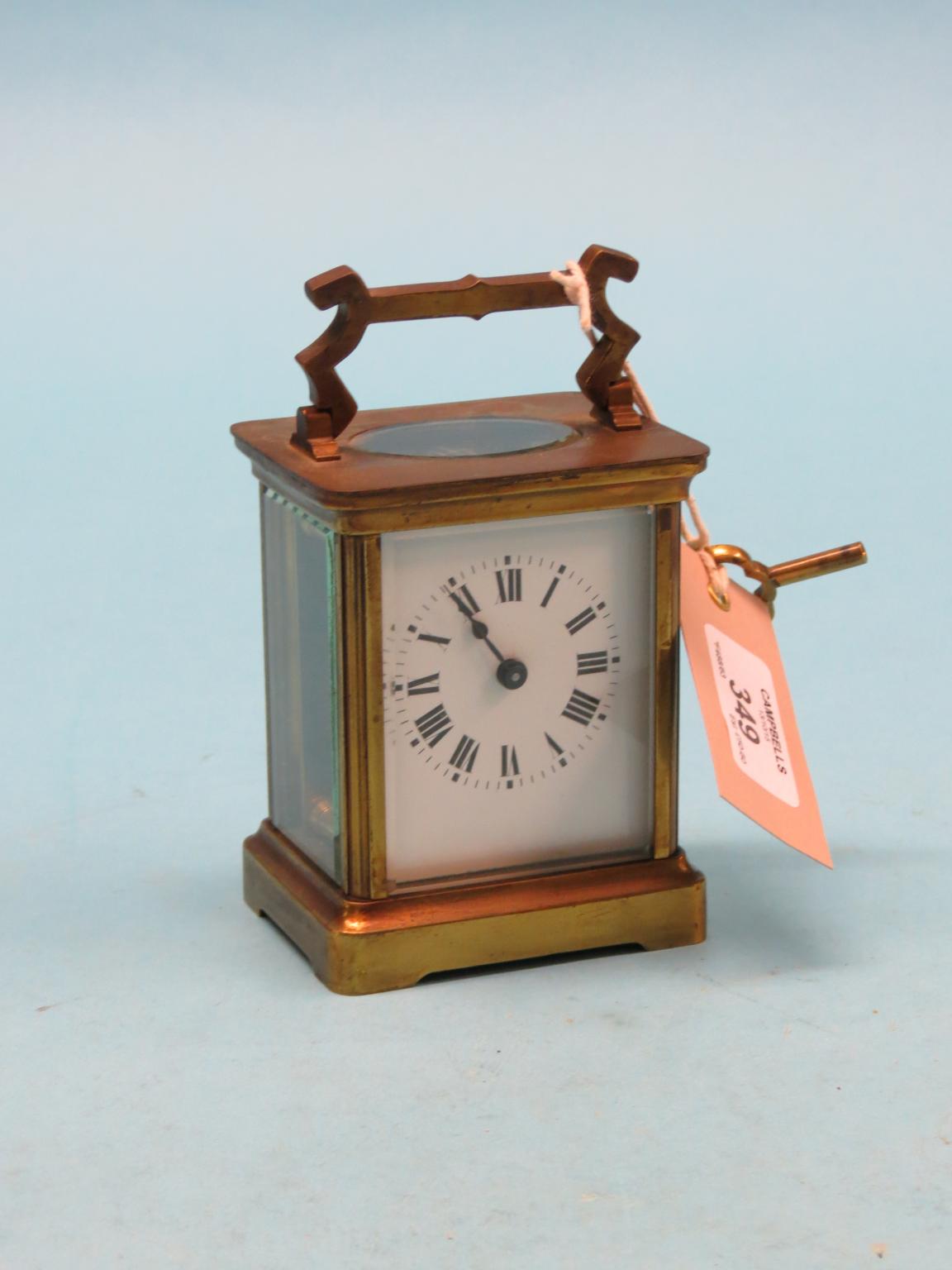 Appraisal: An early th century lacquered brass carriage clock with enamelled