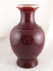 Appraisal: A heavy Chinese sang de boeuf glazed vase ht cm