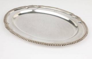 Appraisal: A George III sterling silver serving platter London with maker's