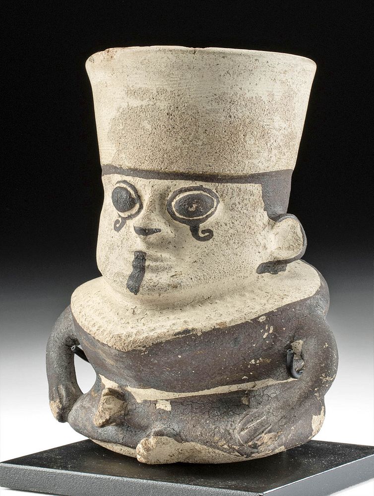 Appraisal: Chancay Bichrome Seated Hunchback Figural Vessel Pre-Columbian central coast Peru