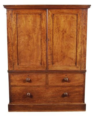 Appraisal: A Victorian mahogany small linen press the moulded cornice above