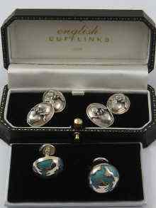 Appraisal: Two pairs of white metal tests silver cufflinks one with