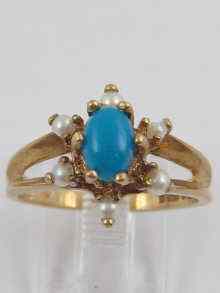 Appraisal: A hallmarked ct gold turquoise and pearl ring