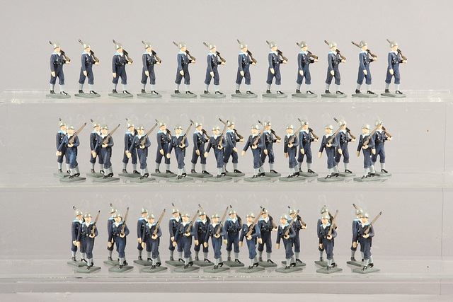 Appraisal: Lot of plastic figures painted matte marching at slope