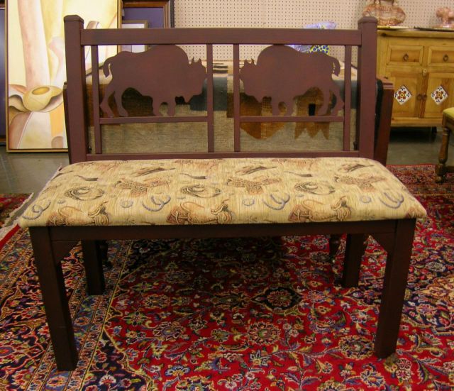 Appraisal: Cast metal buffalo motif bench with western motif upholstered seat