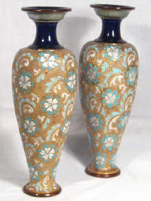 Appraisal: A pair of Doulton vases with gilt lace decoration impressed