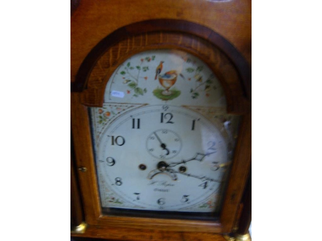 Appraisal: A Georgian oak longcase clock with walnut cross banding the