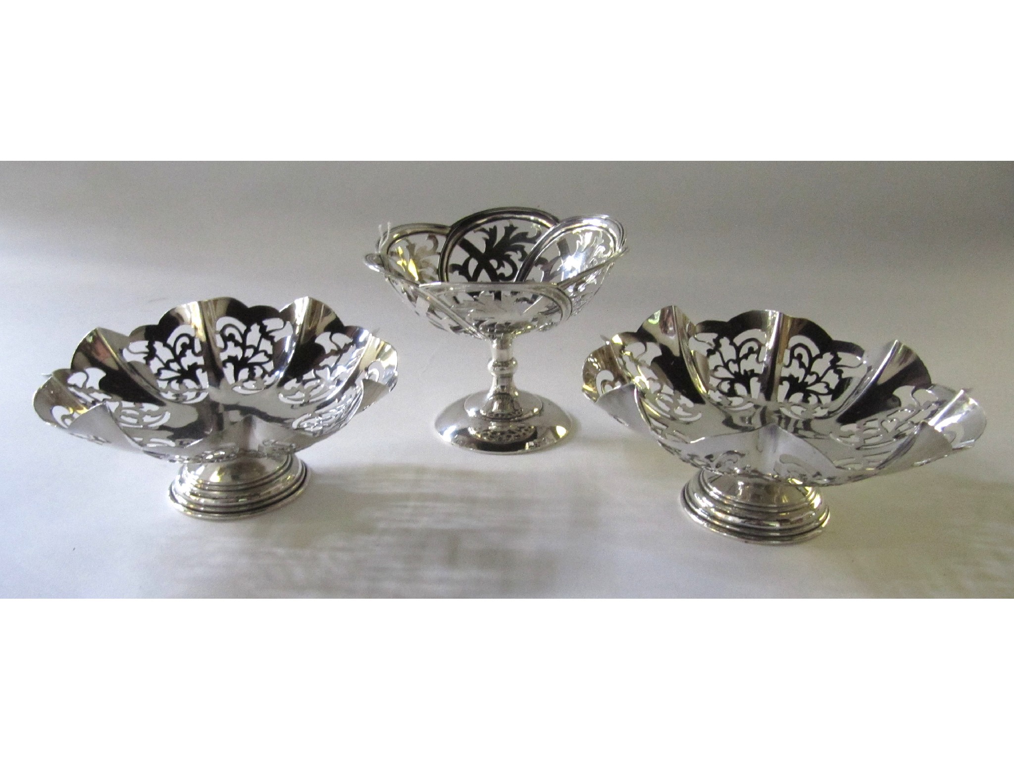 Appraisal: A lot comprising a pair of silver pedestal dishes and