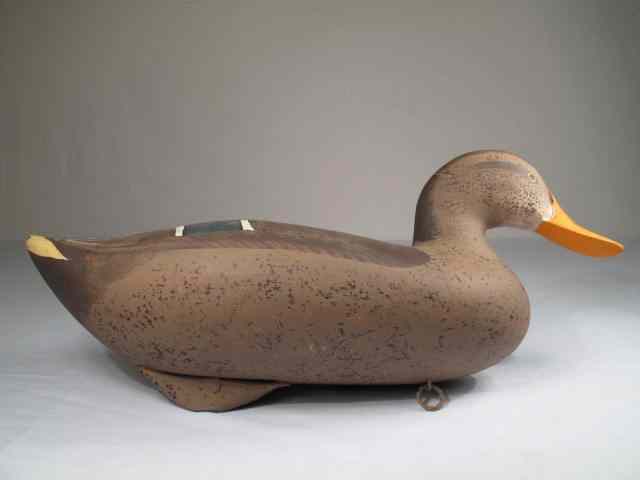 Appraisal: Patrick Vincenti carved duck decoy Carved and painted weighted on