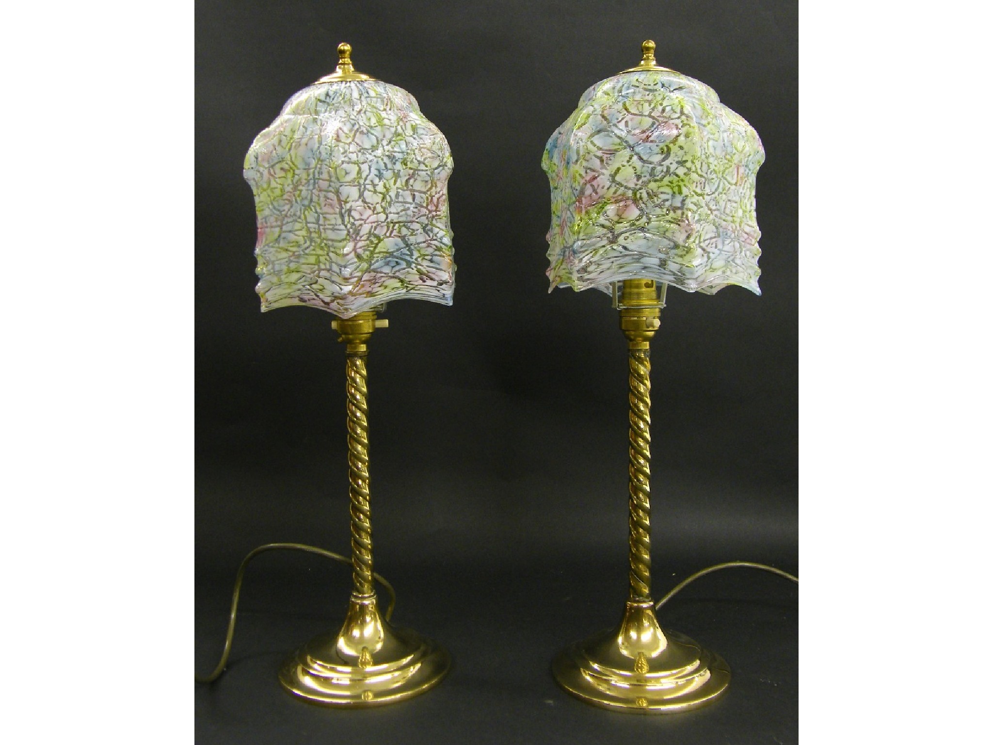 Appraisal: Pair of barley twist stick table lamps with mottled glass