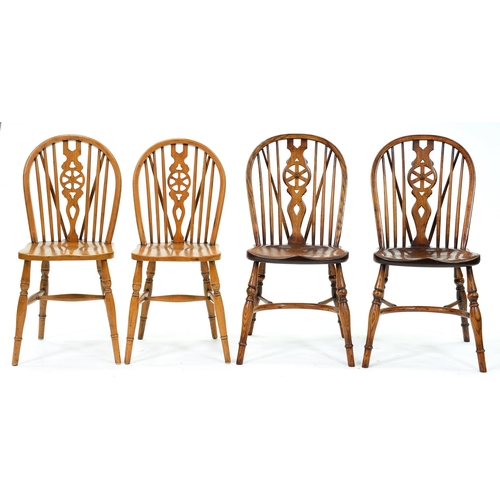 Appraisal: A pair of ash wheel back Windsor chairs and another