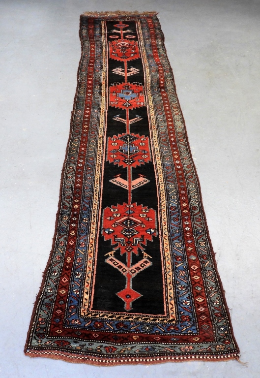 Appraisal: NORTHWEST PERSIAN RUG RUNNER Middle EastEarly th CenturyBlue pink yellow