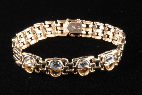 Appraisal: K YELLOW GOLD COLORED STONE BRACELET Bezel set in the