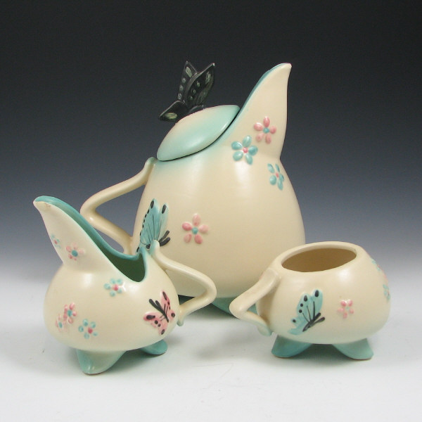 Appraisal: Hull Butterfly Three-Piece Tea Set Butterfly three-piece tea set in