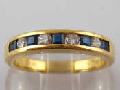 Appraisal: An carat gold sapphire and diamond ring with retailer's guide