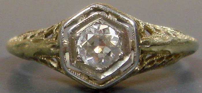 Appraisal: K YG filigree ring pt center stone size dwt Estimate