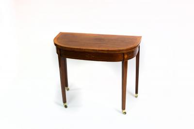 Appraisal: A George III mahogany tea table crossbanded and inlaid boxwood