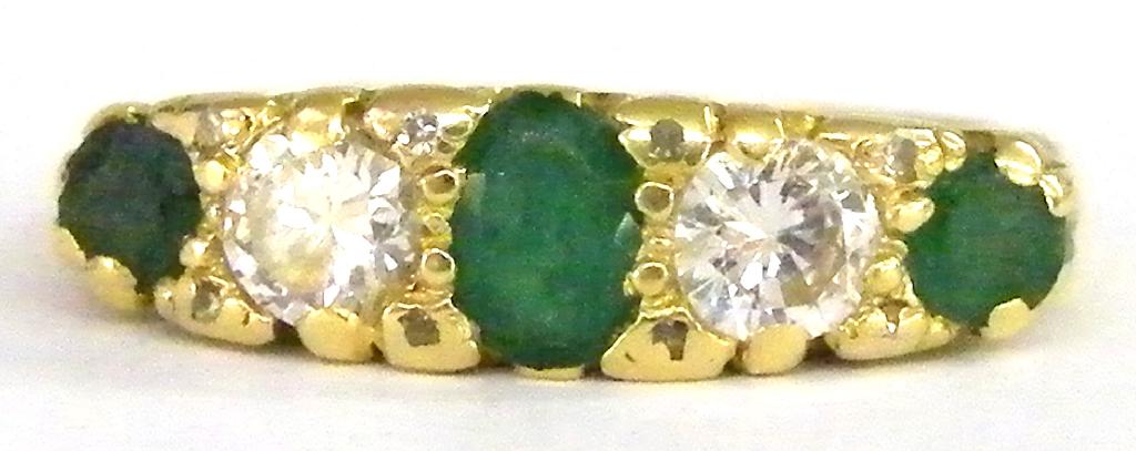 Appraisal: ct emerald and diamond five stone ring in a scroll