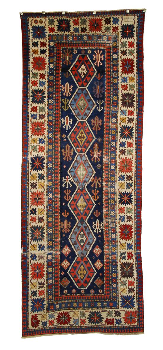 Appraisal: KUBA RUG Caucasus dated feet inches x feet inches