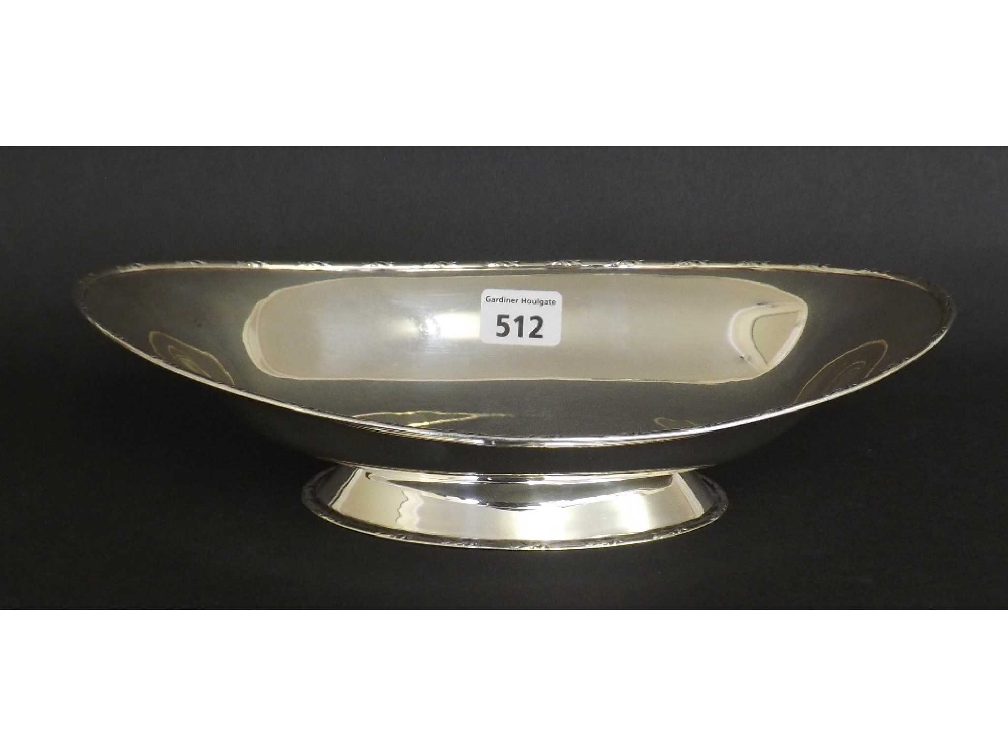 Appraisal: Silver oval bonbon dish with geometric floral rim hallmarks worn